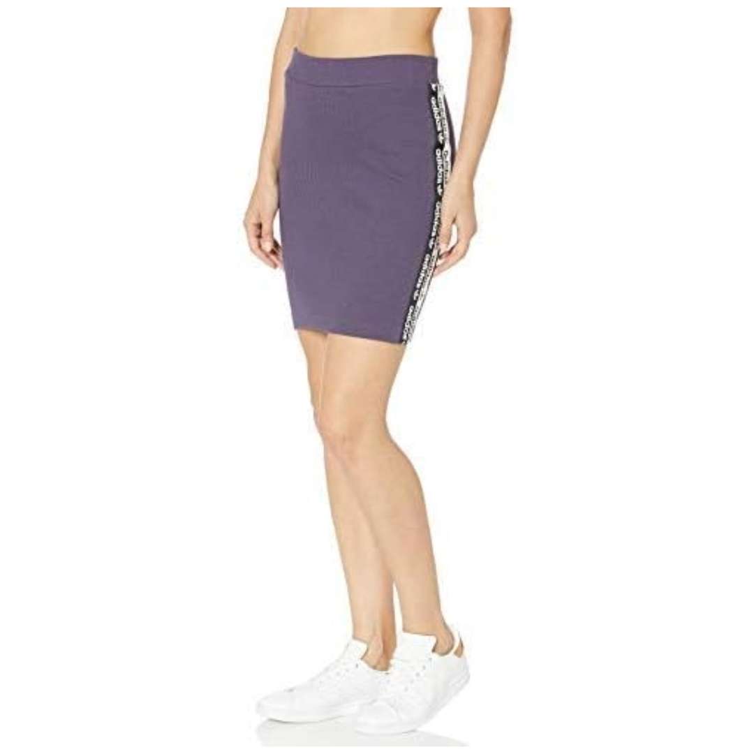A stylish view of the adidas Originals Women's Tape Skirt in trace purple.