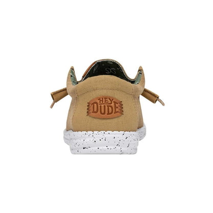 A pair of Hey Dude Men's Wally Washed Canvas shoes in walnut