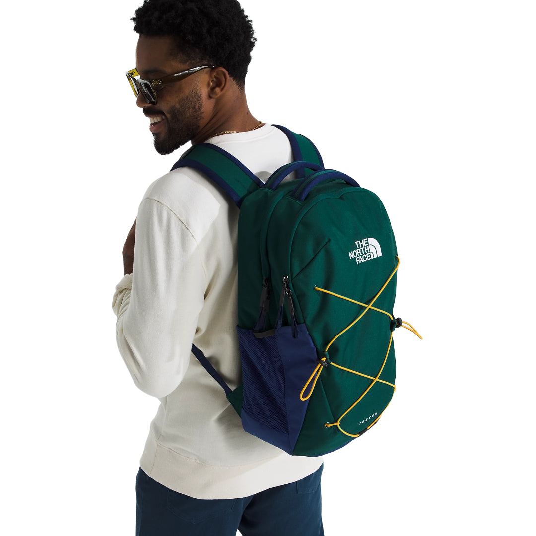 The North Face Jester Backpack in black, featuring a spacious design with multiple compartments and adjustable shoulder straps.