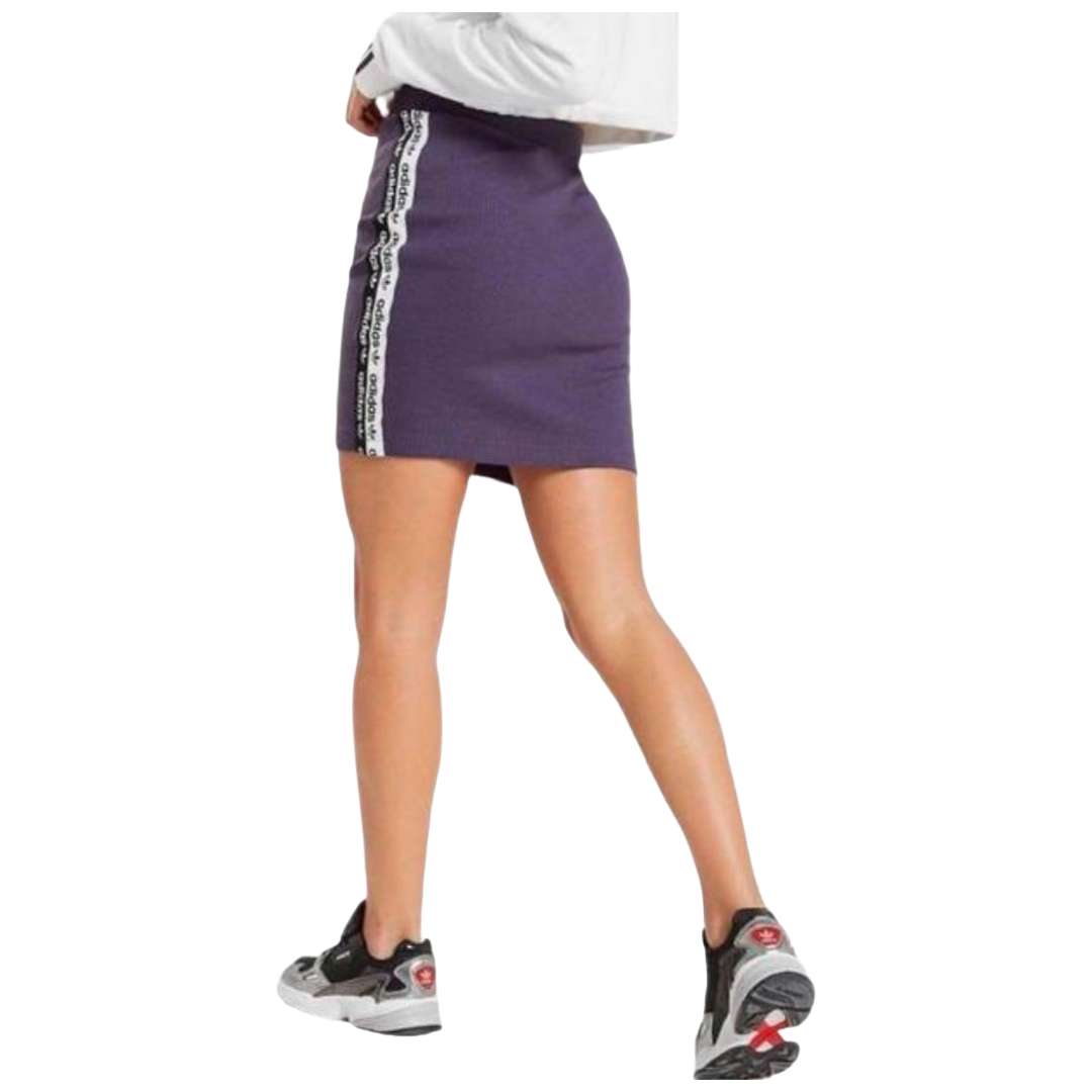 A stylish view of the adidas Originals Women's Tape Skirt in trace purple.