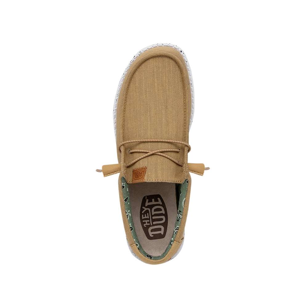 A pair of Hey Dude Men's Wally Washed Canvas shoes in walnut