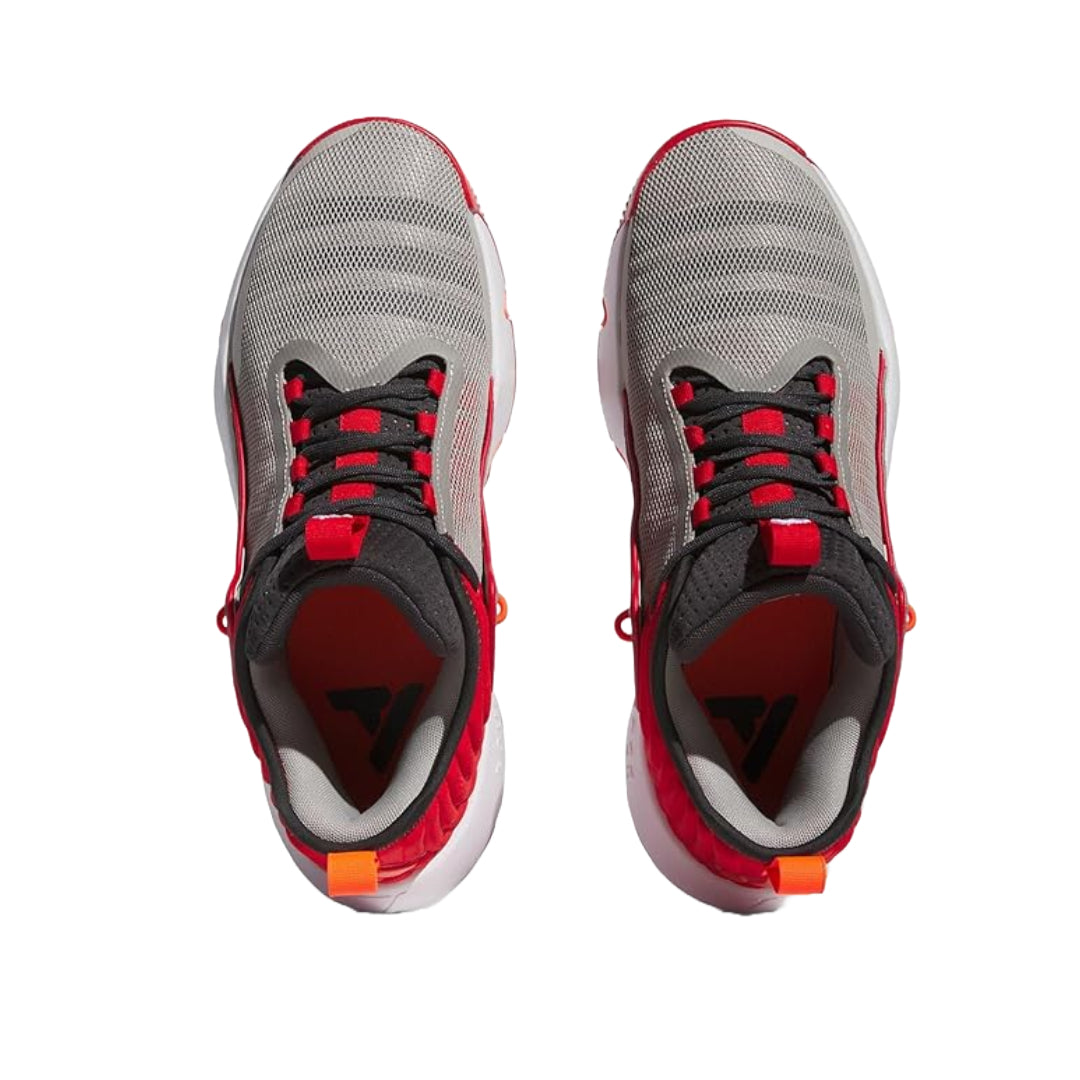 adidas Trae Unlimited Shoes in black and white, featuring a sleek design with a cushioned sole and breathable upper.