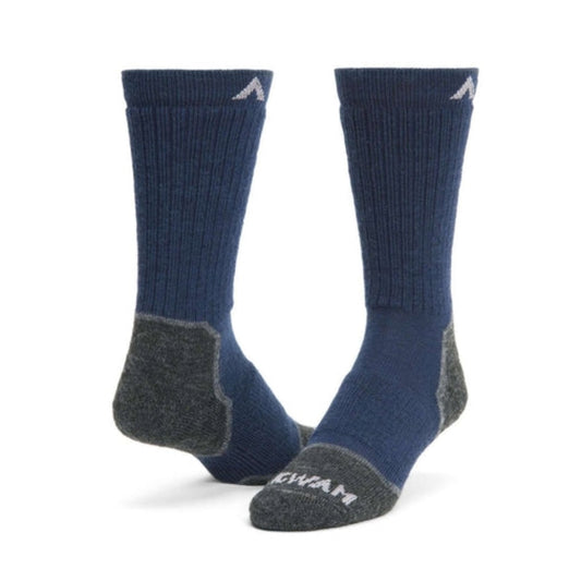 Wigwam Snow Sirocco knee-high ski socks featuring merino wool-blend construction, lightweight cushioning, and performance winter styling for skiing and snowboarding.