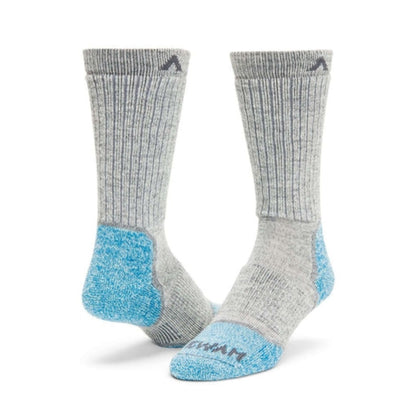 Wigwam Men’s Snow Sirocco knee-high ski socks featuring merino wool-blend construction, lightweight cushioning, and performance winter styling for skiing and snowboarding