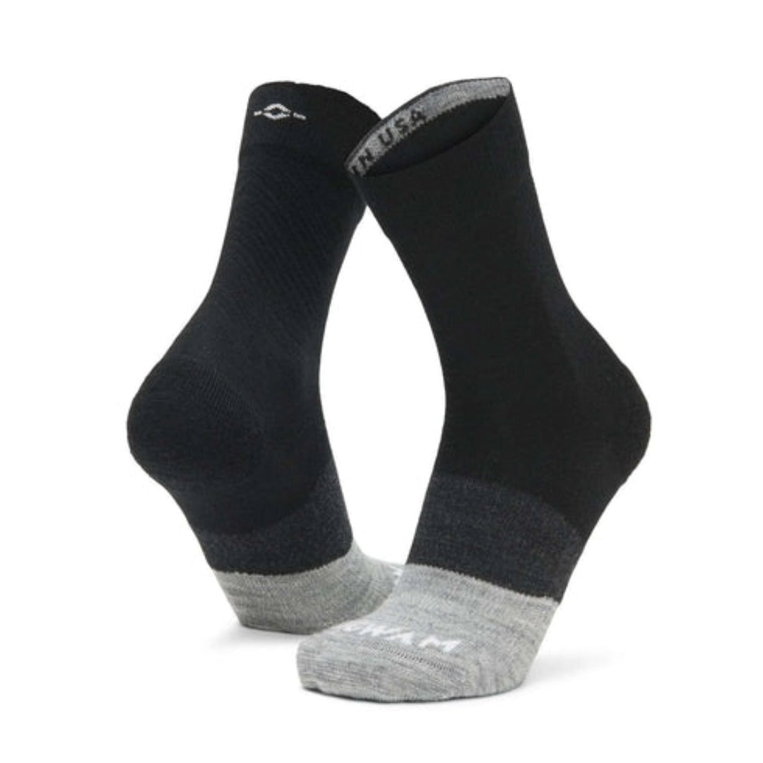 WIGWAM Trail Junkie lightweight mid crew socks featuring breathable merino wool-blend construction, cushioned trail-running comfort, and rugged outdoor performance styling for hiking and running