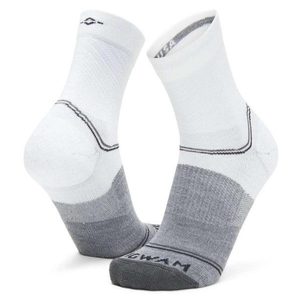 WIGWAM Surpass lightweight mid crew socks featuring breathable performance knit construction, cushioned athletic comfort, and moisture-wicking support for running and training