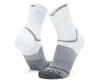 WIGWAM Surpass lightweight mid crew socks featuring breathable performance knit construction, cushioned athletic comfort, and moisture-wicking support for running and training