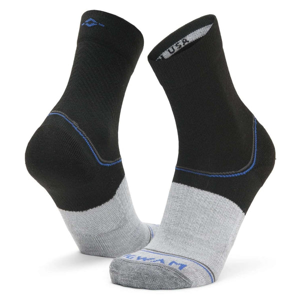 WIGWAM Surpass lightweight mid crew socks featuring breathable performance knit construction, cushioned athletic comfort, and moisture-wicking support for running and training