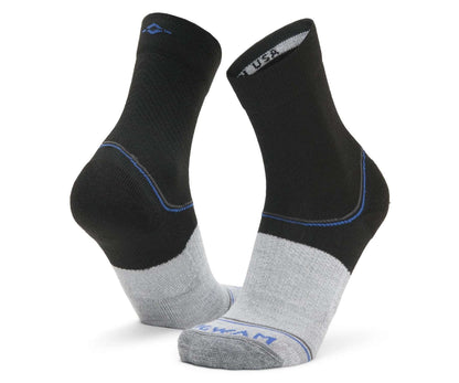 WIGWAM Surpass lightweight mid crew socks featuring breathable performance knit construction, cushioned athletic comfort, and moisture-wicking support for running and training