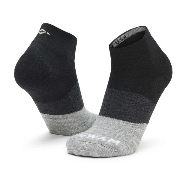 WIGWAM Trail Junkie lightweight quarter socks featuring breathable merino wool-blend construction, cushioned trail-running comfort, and low-profile outdoor performance styling