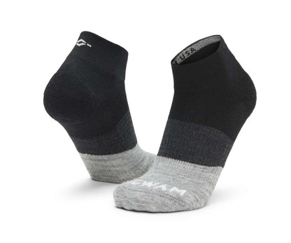 WIGWAM Trail Junkie lightweight quarter socks featuring breathable merino wool-blend construction, cushioned trail-running comfort, and low-profile outdoor performance styling