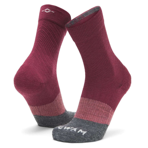 WIGWAM Trail Junkie lightweight mid crew socks featuring breathable merino wool-blend construction, cushioned trail-running comfort, and rugged outdoor performance styling for hiking and running