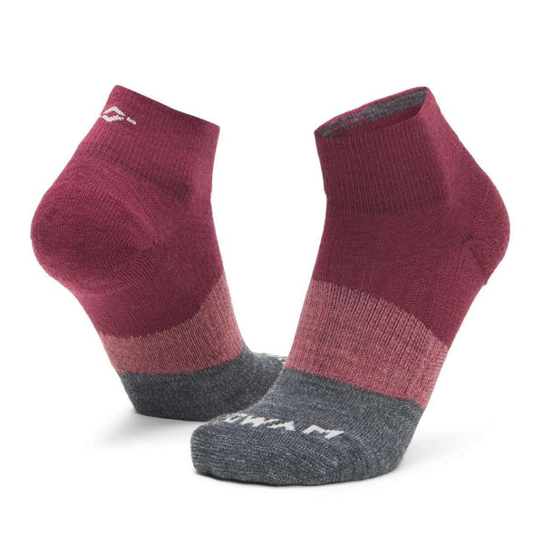 WIGWAM Trail Junkie lightweight quarter socks featuring breathable merino wool-blend construction, cushioned trail-running comfort, and low-profile outdoor performance styling