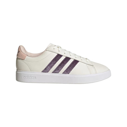 Women’s low-top casual sneakers featuring a smooth synthetic leather upper, lace-up closure, padded collar, cushioned footbed, classic court-inspired silhouette, and durable rubber outsole for everyday wear