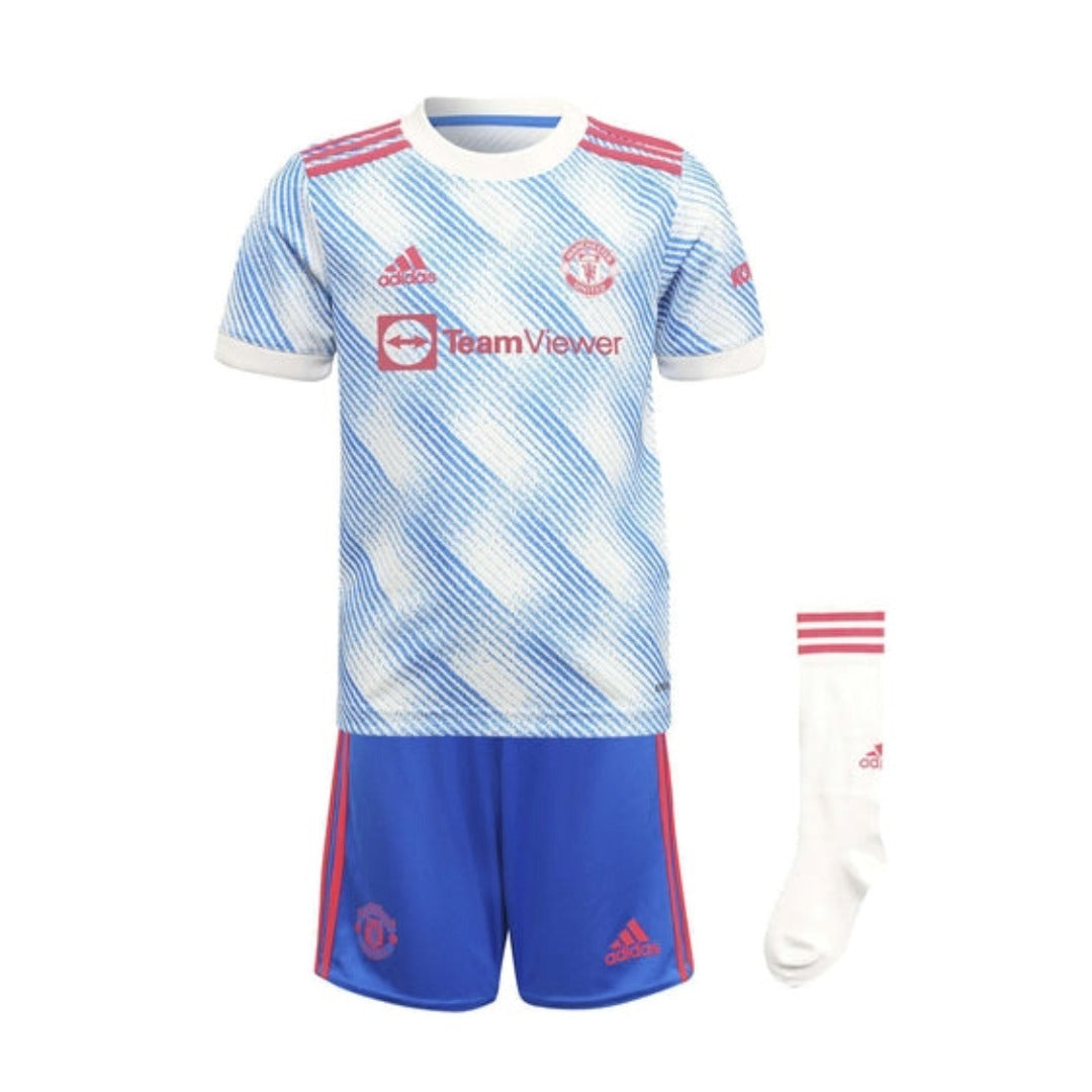 Kids wearing an adidas Manchester United 21/22 away mini kit, featuring jersey, shorts, and socks with a sporty team design.