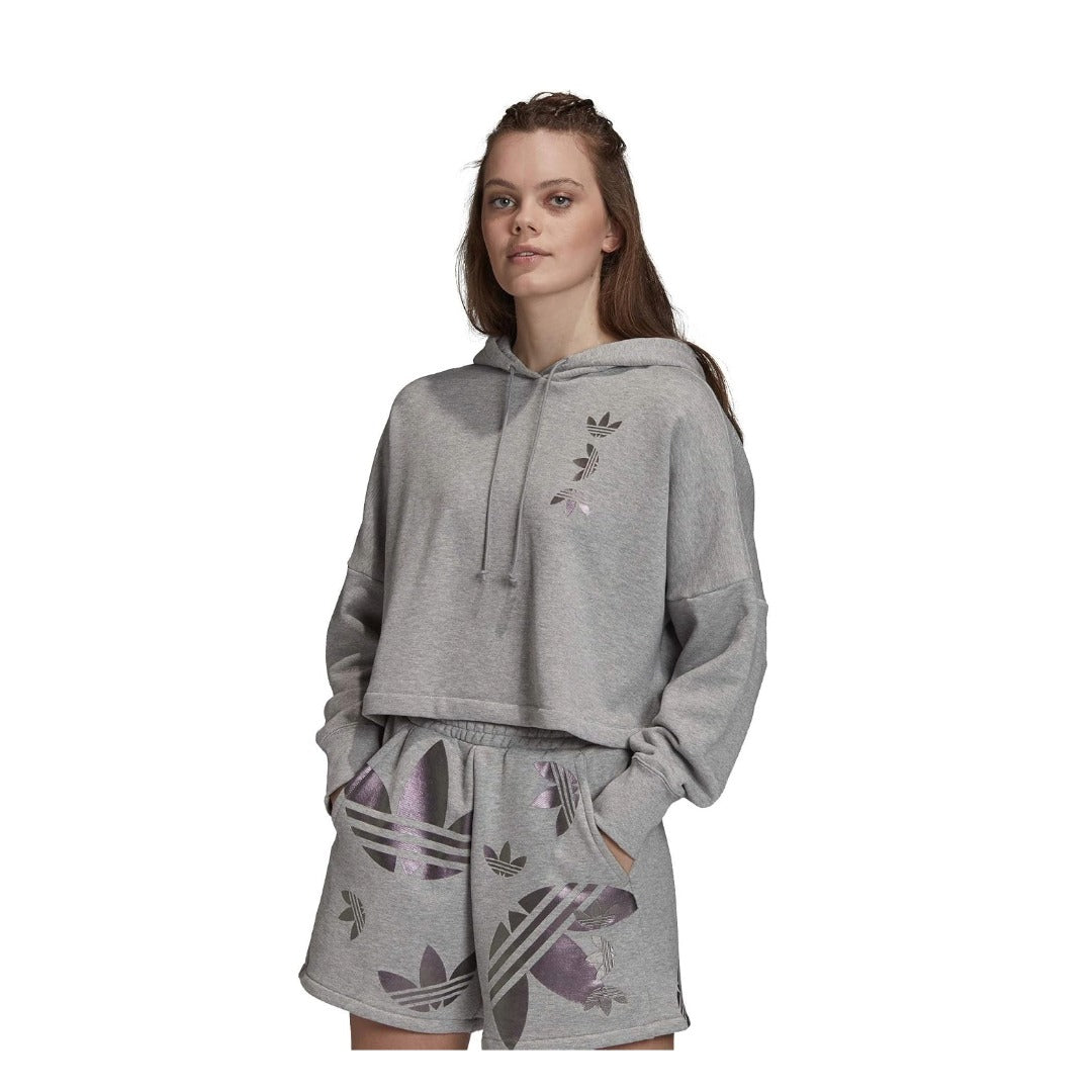 Women’s cropped hoodie featuring soft fleece fabric, a large front logo, adjustable drawstring hood, ribbed cuffs and hem, and a relaxed fit for casual everyday wear