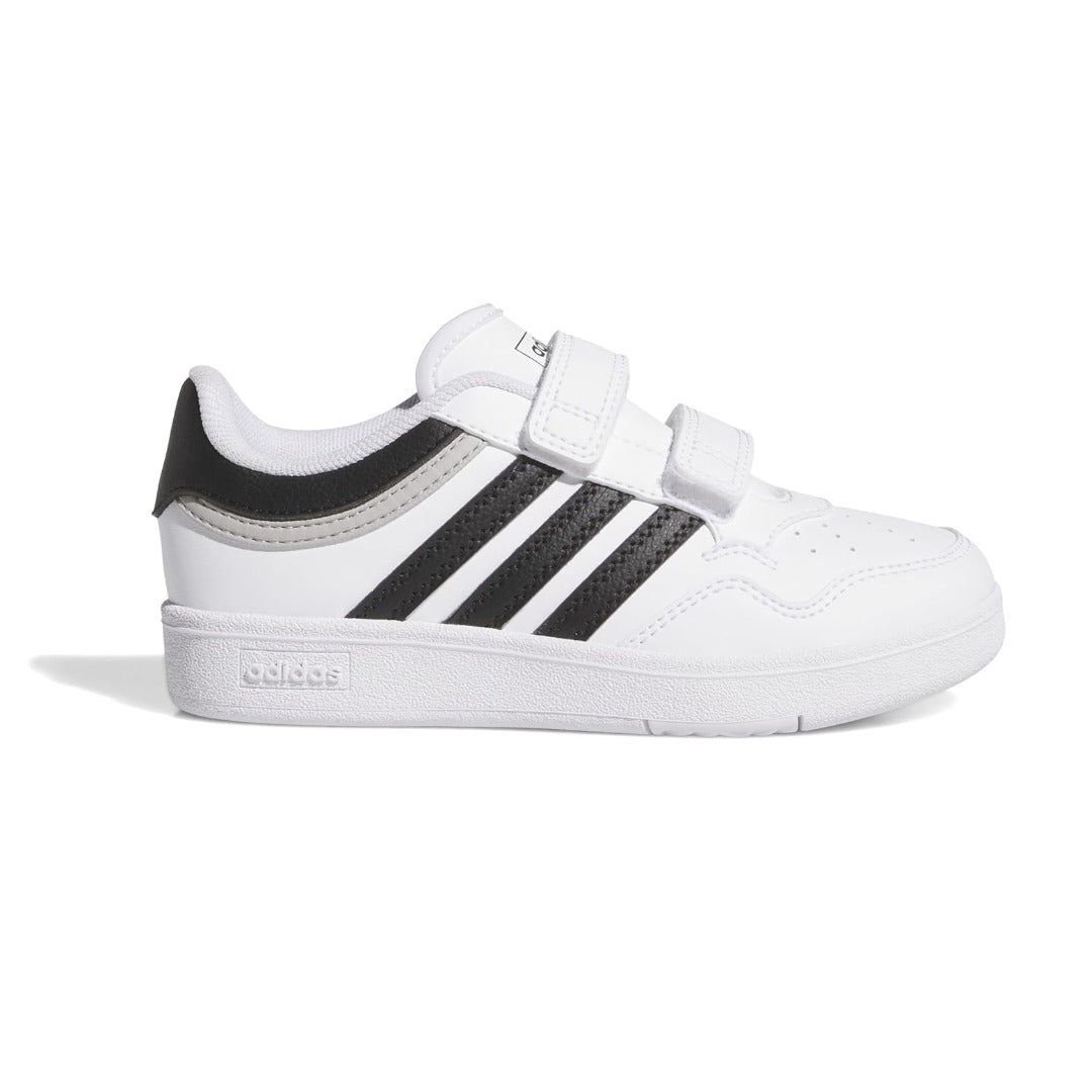 adidas Unisex-Child Hoops 4.0 Basketball Sneaker in white with black 3-Stripes and mid-top design for ankle support.









