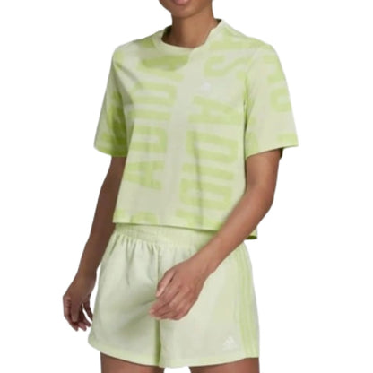 adidas Women's BLUV Q2 Cropped Tee in white with bold adidas logo, short sleeves, and relaxed cropped silhouette.
