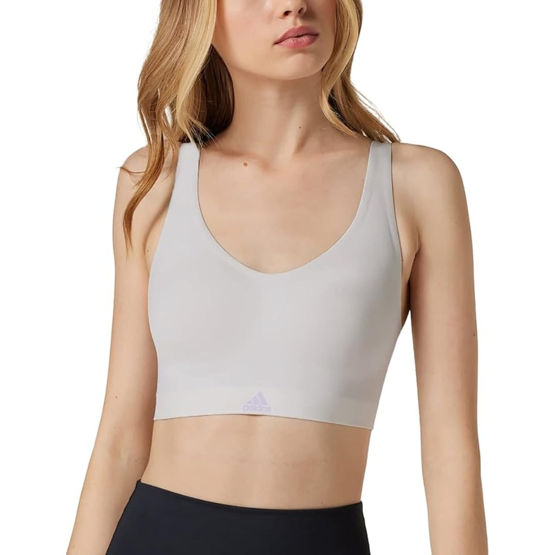 adidas Women’s Naked Seamless 2 Ply Bra in sleek black with racerback design and minimal branding.